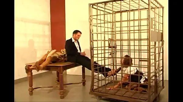 نئے German secretary girl licks feet and sucks cock of her boss in cage زبردست ویڈیوز